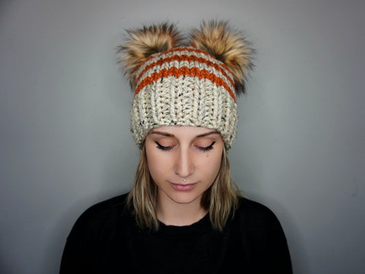 The Striped Double Pom Beanie in Oatmeal and Leaves